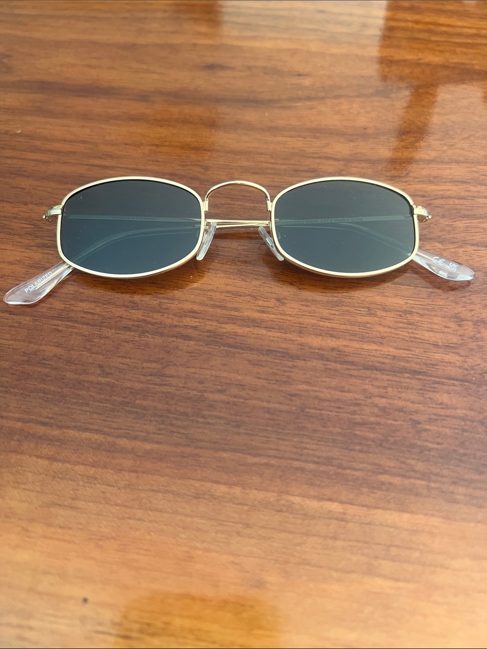 Meller Suku Sunglasses in Gold Olive